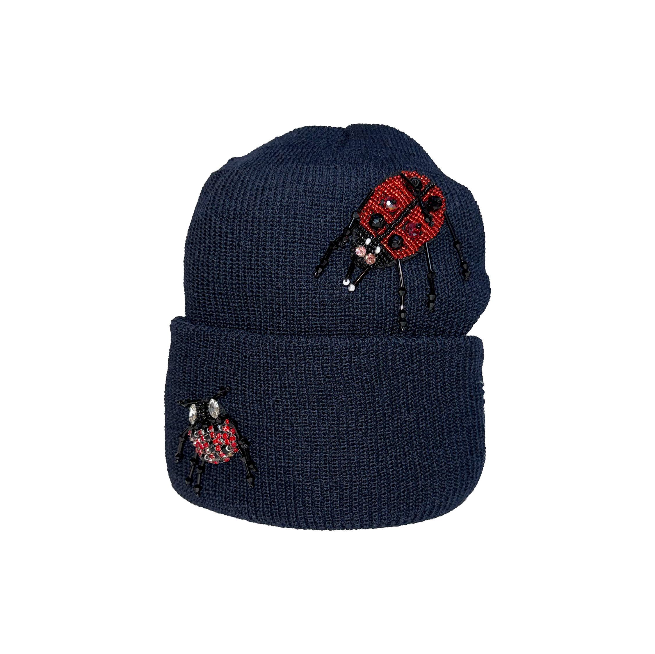 Navy blue beanie with red and black ladybug designs on a white background.