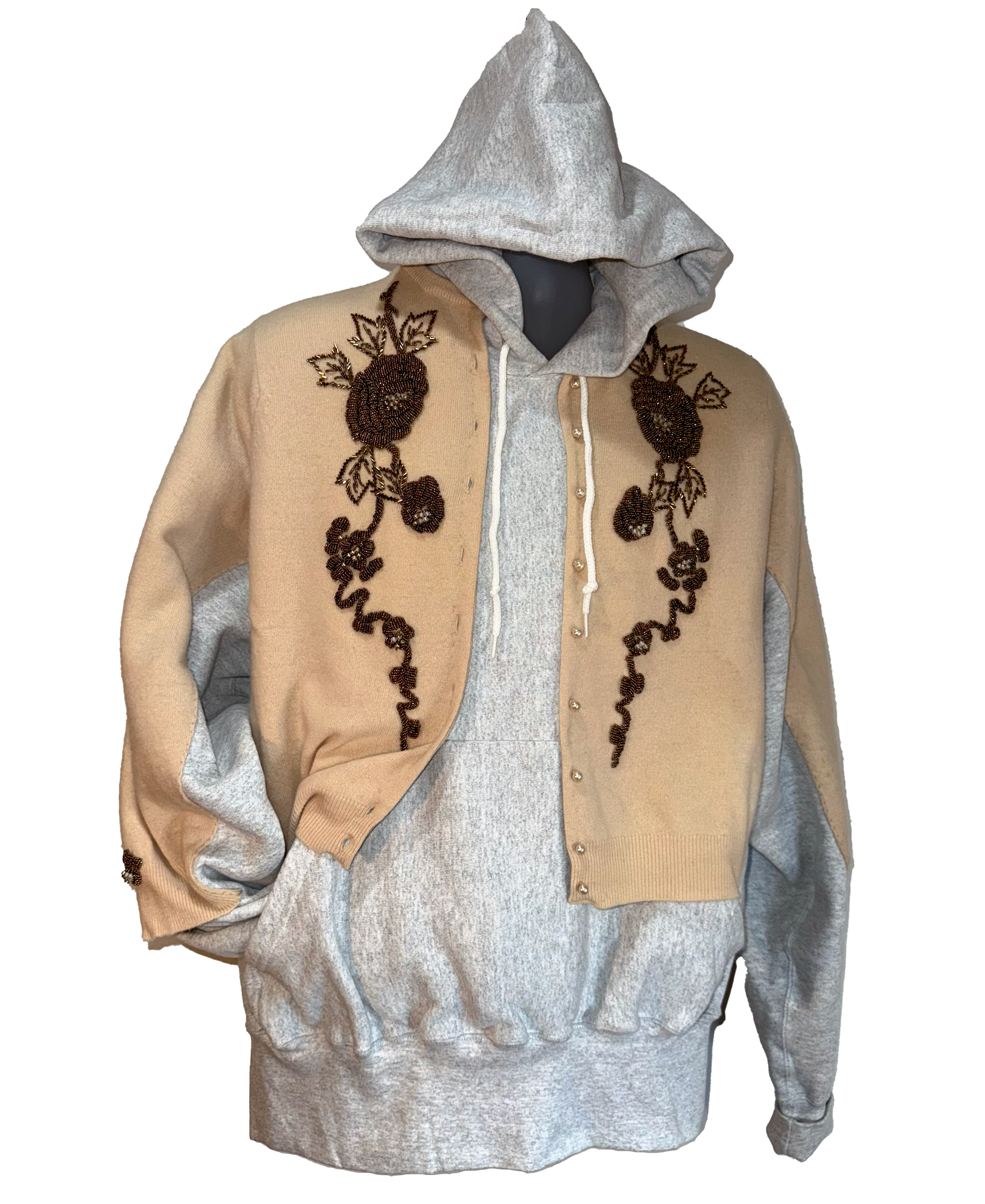 Hoodie with floral embroidery on a beige and gray background