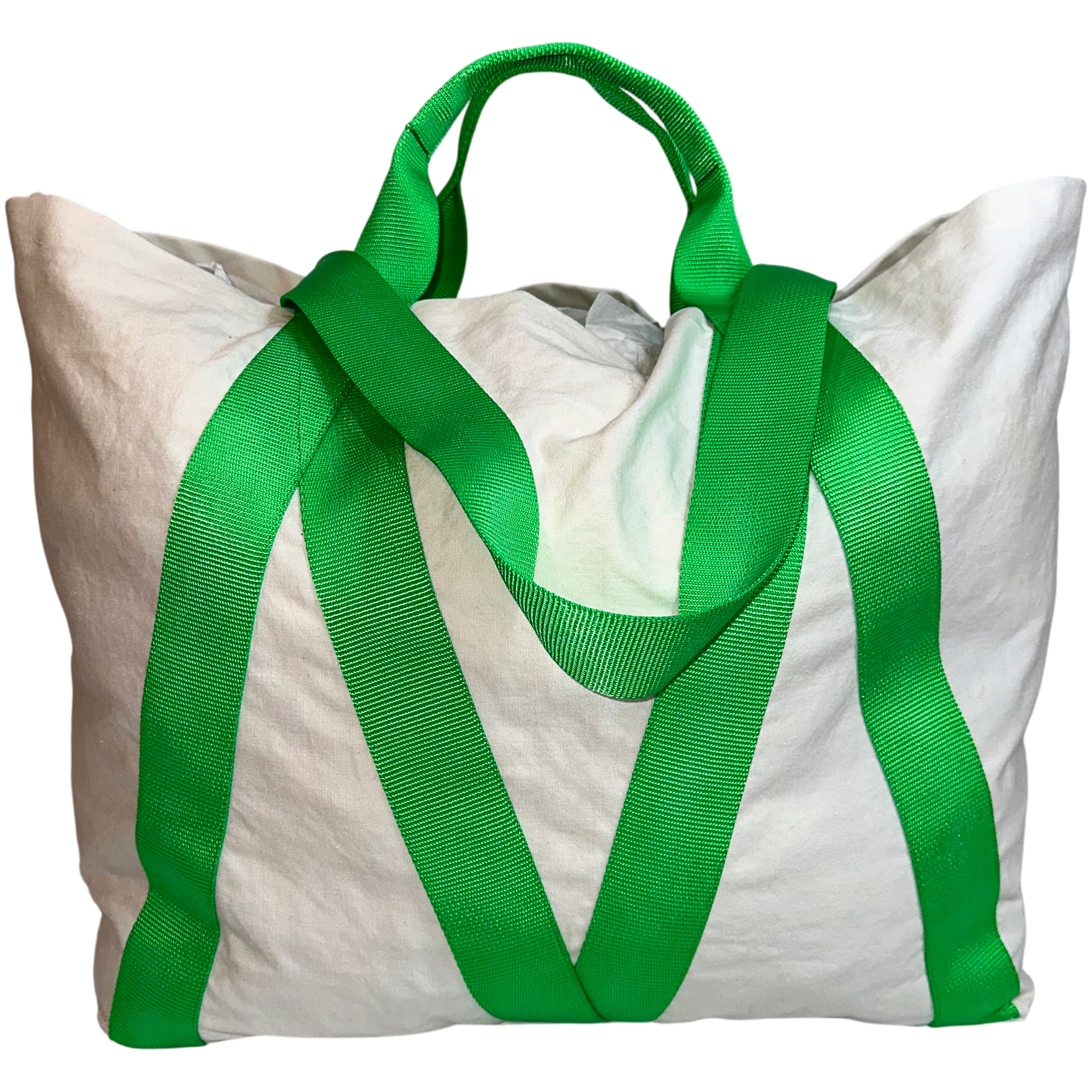 White tote bag with green handles on a white background.