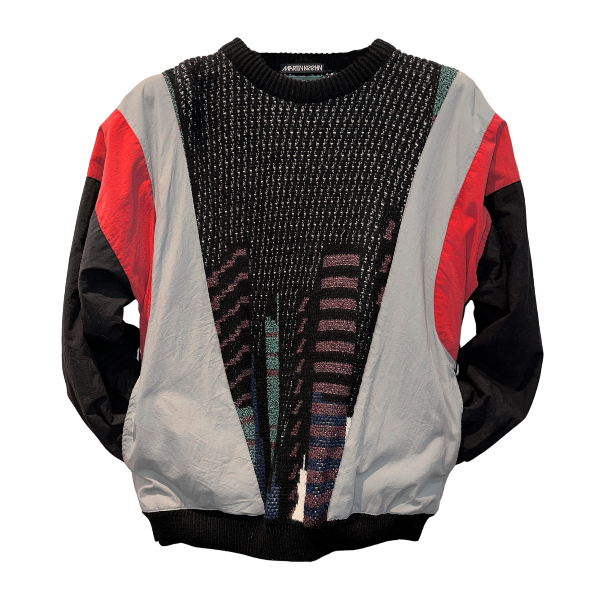 Multicolored sweater with a patterned design on a white background.