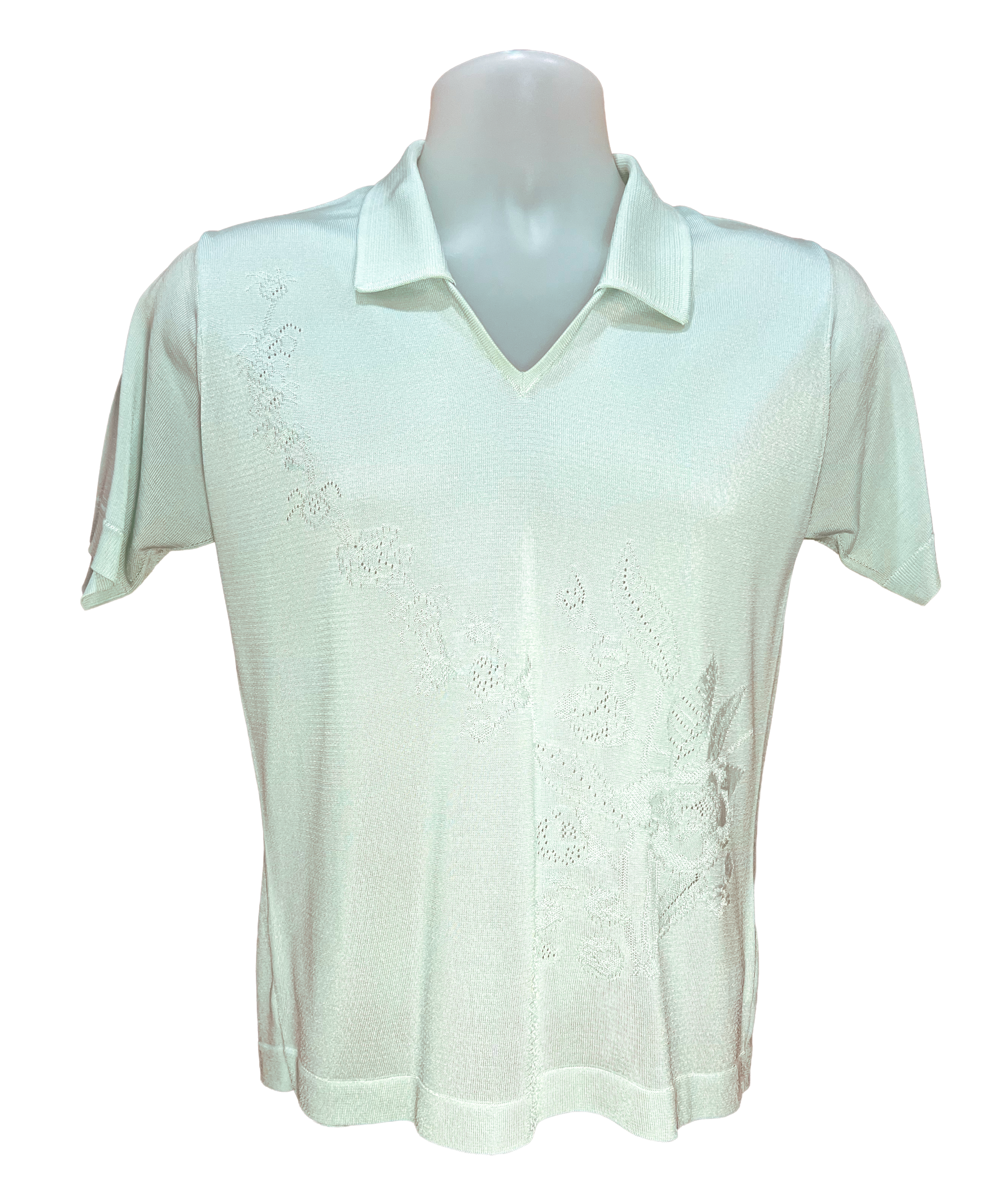 White polo shirt on a mannequin against a white background.