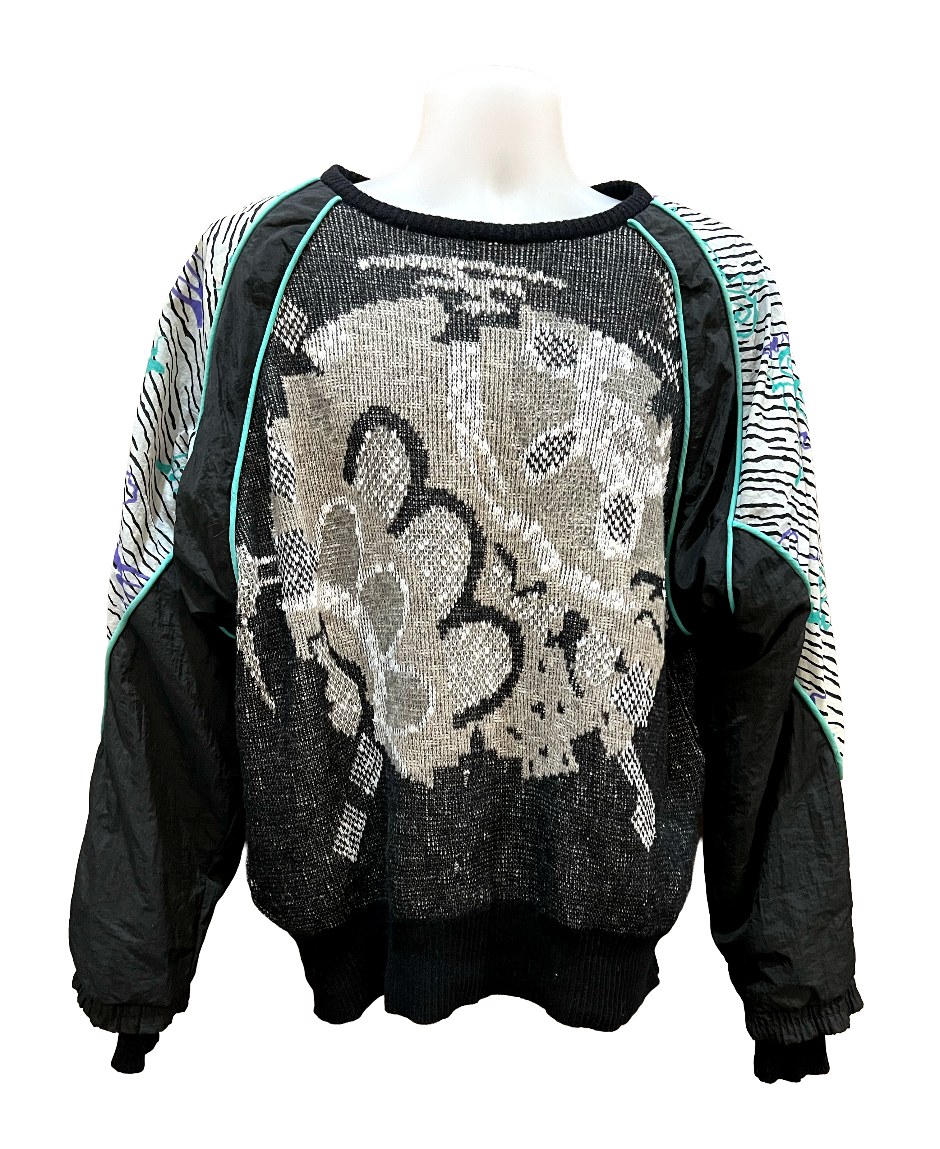 Black jacket with sequin design on a mannequin against a white background.