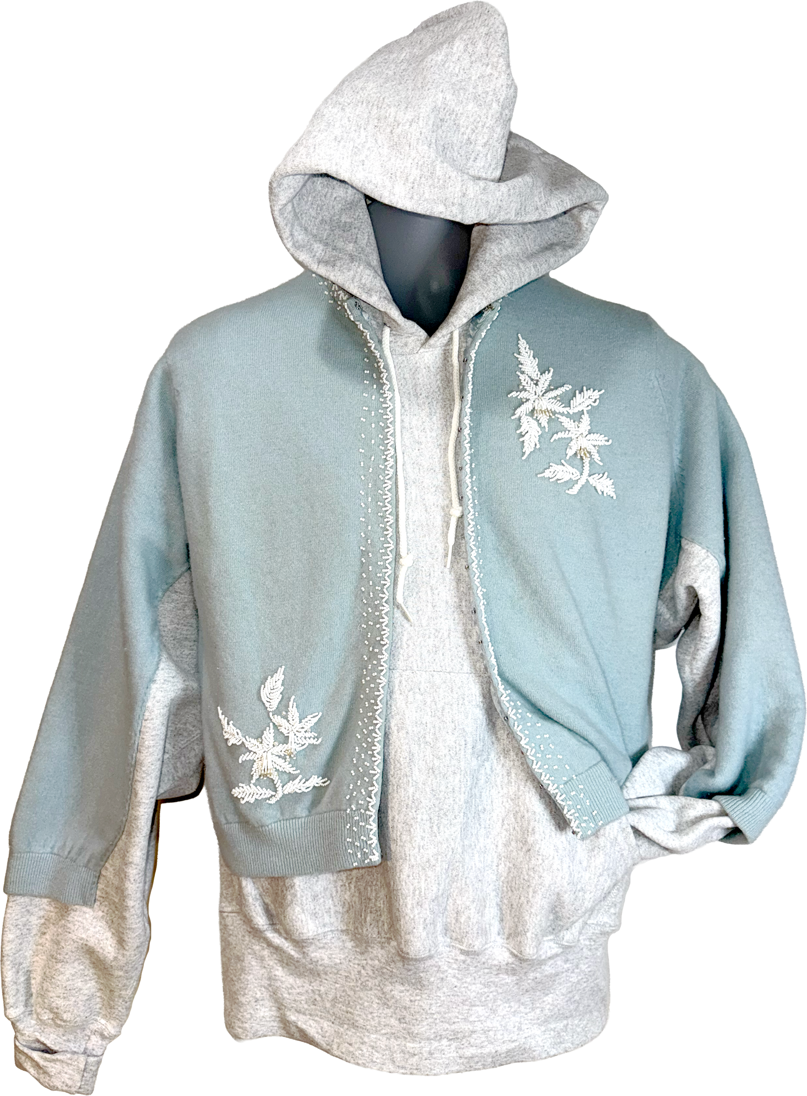 Light blue hoodie with white floral embroidery on a white background.