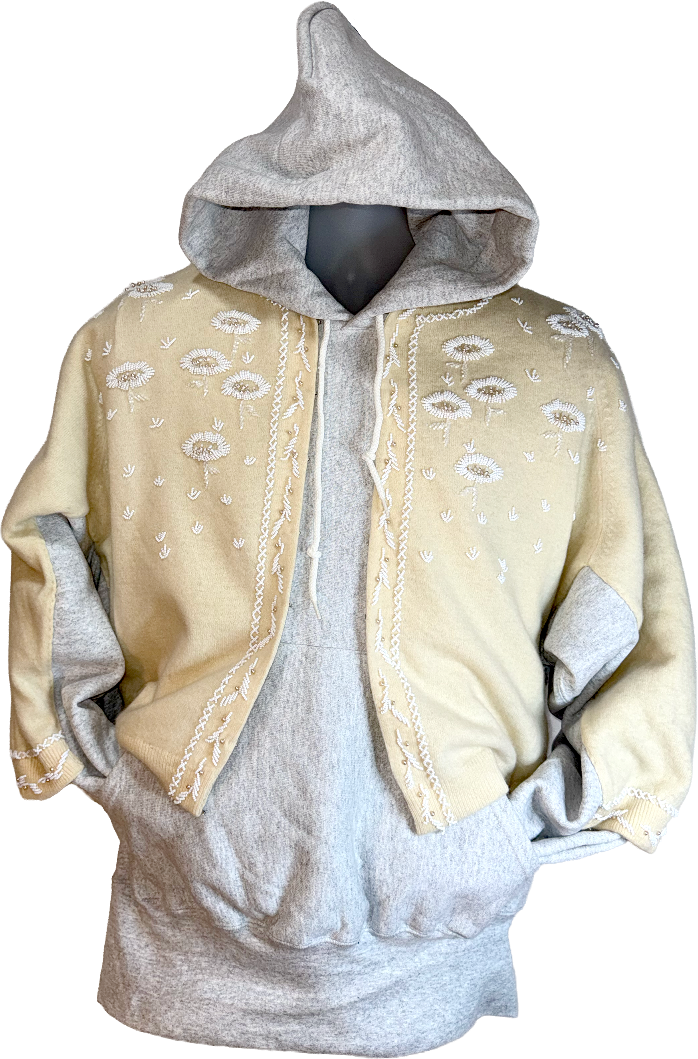 Hooded jacket with floral pattern on a mannequin against a white background.