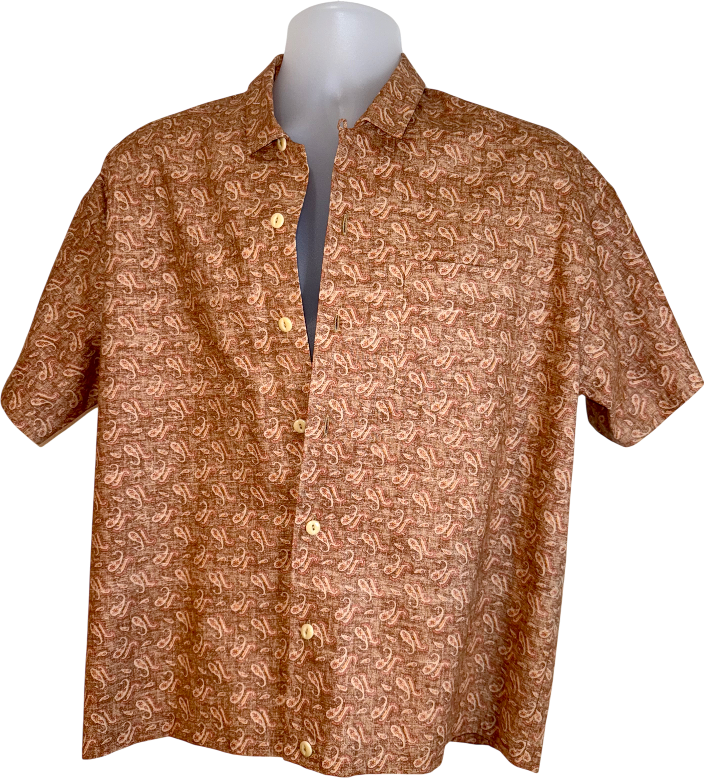 Brown patterned shirt on a mannequin against a white background.