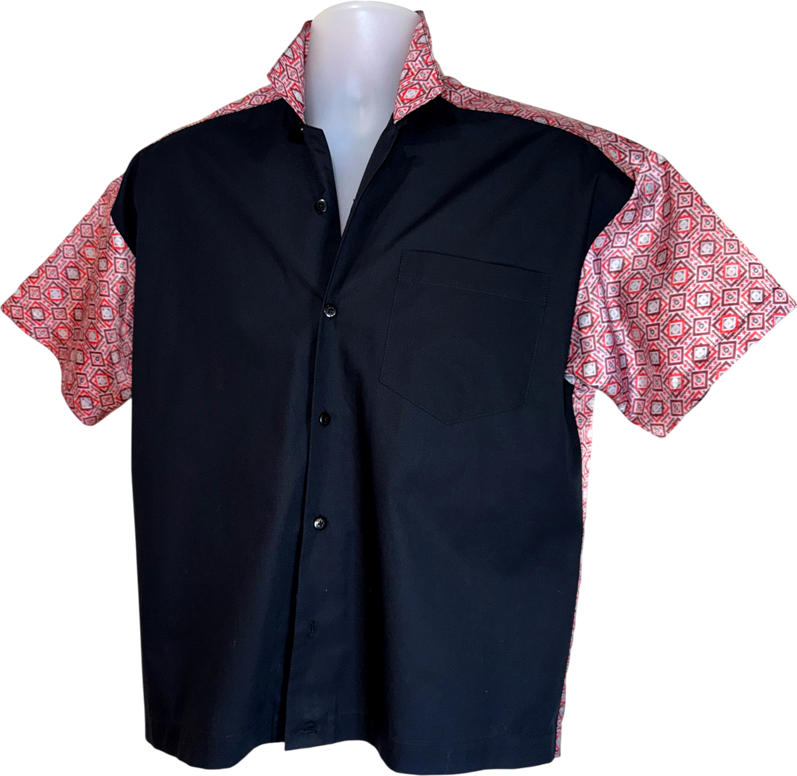 Black shirt with red and white patterned sleeves on a mannequin against a white background.