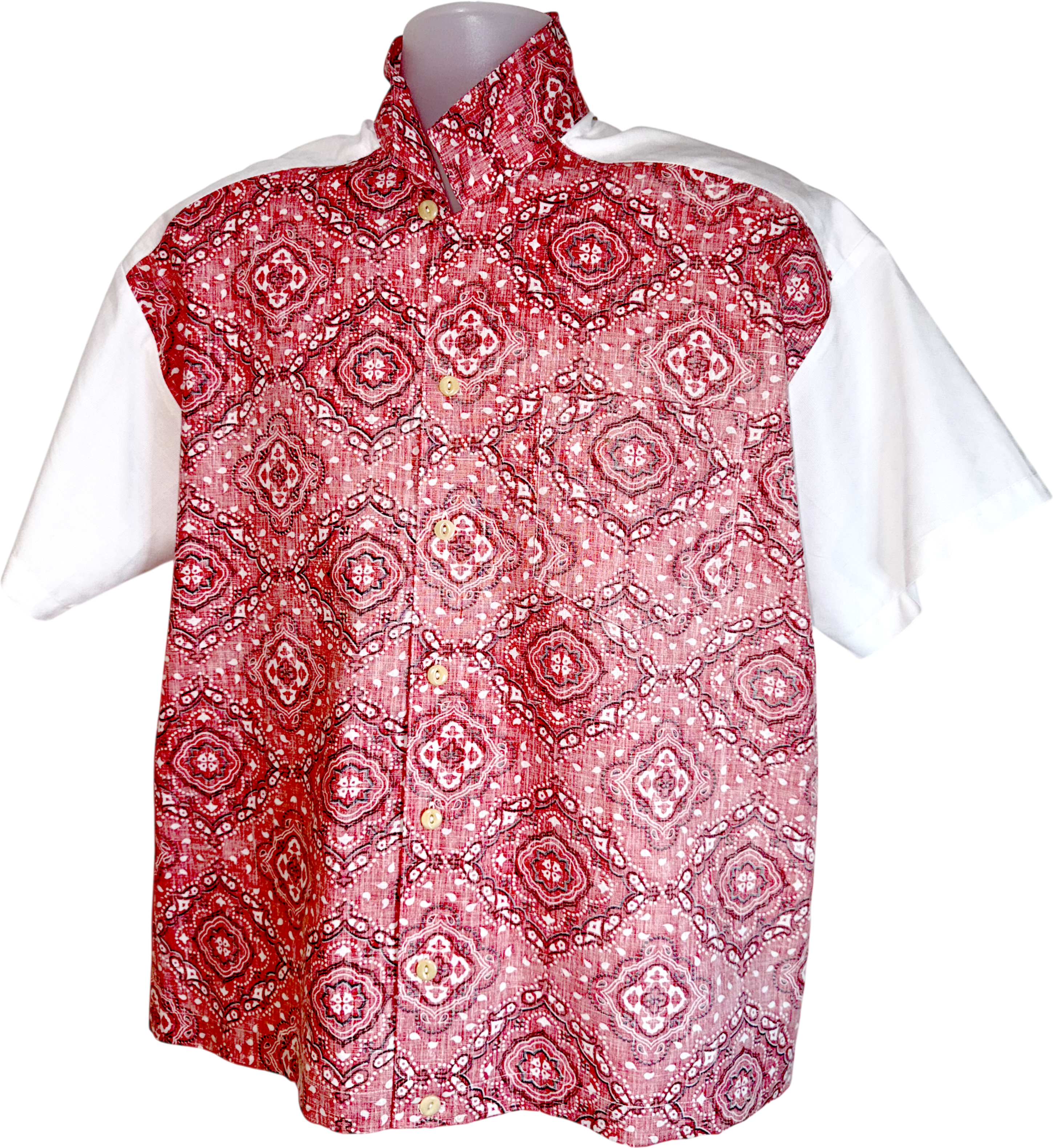 Red patterned vest over a white shirt on a mannequin against a white background.