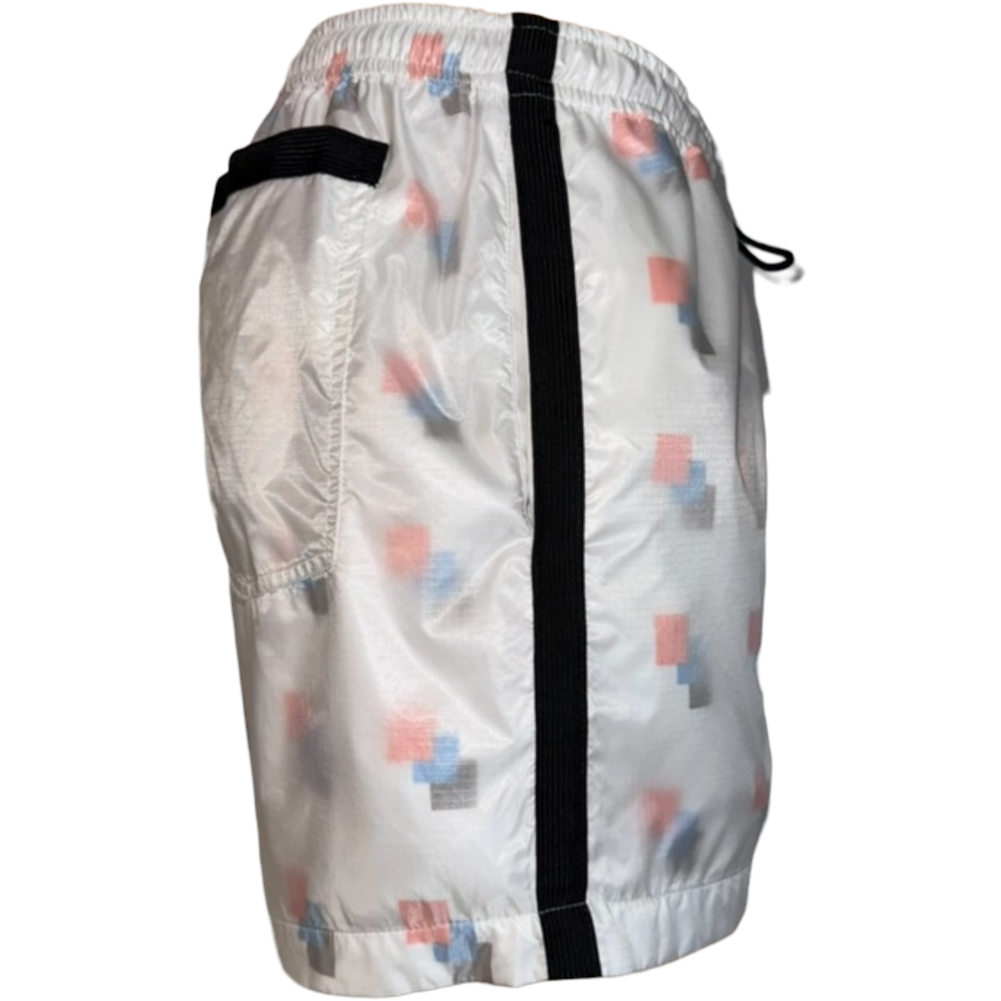 White shorts with colorful geometric pattern and black waistband on a white background