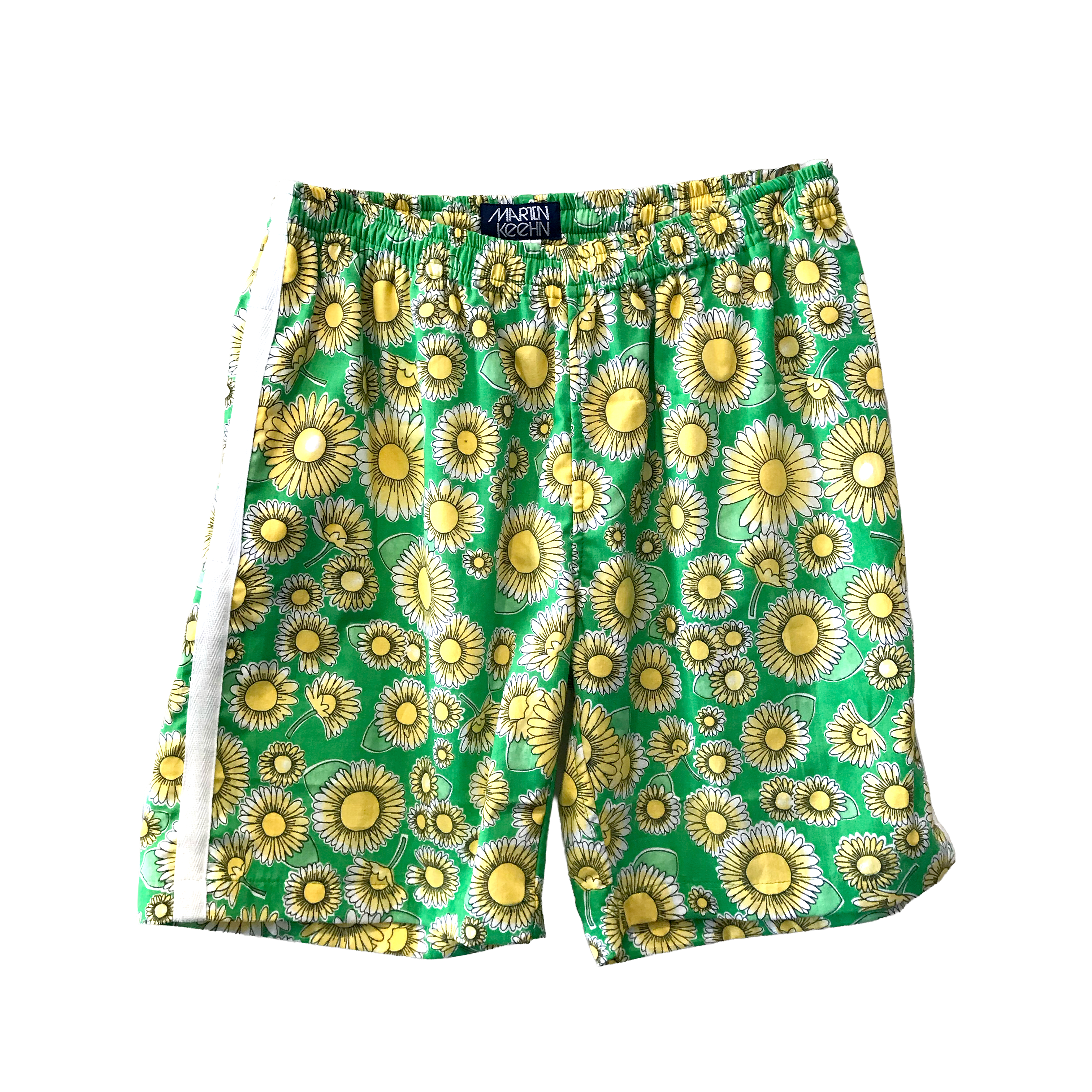 Green shorts with yellow floral pattern on a white background.
