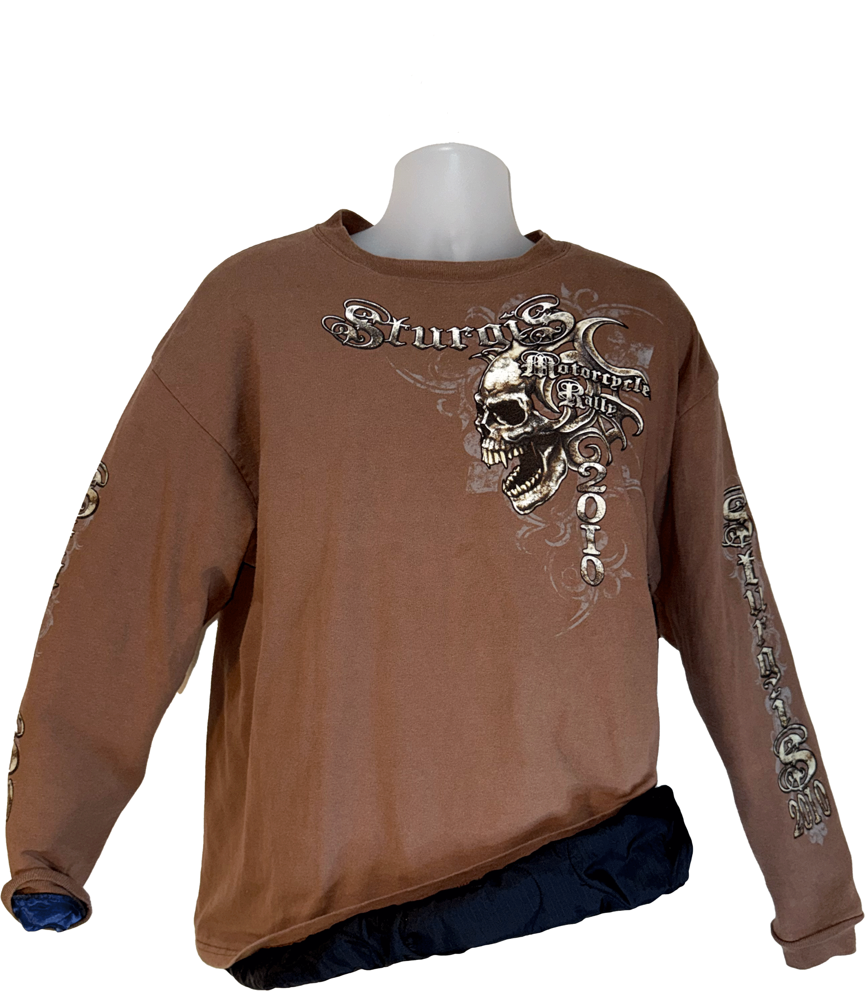 Brown long-sleeve shirt with skull and text design on a mannequin against a white background