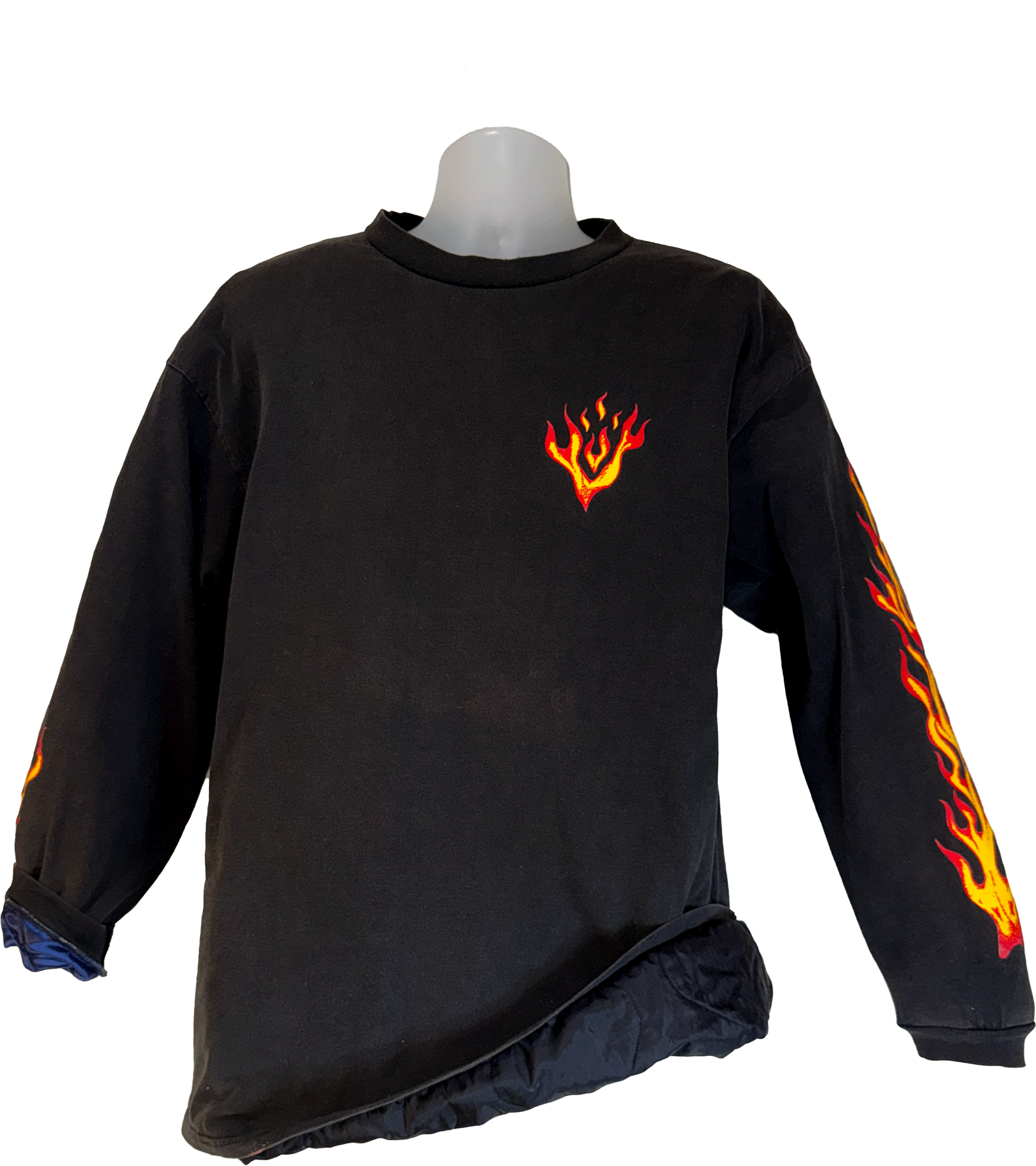 Black long-sleeve shirt with flame designs on a mannequin against a white background