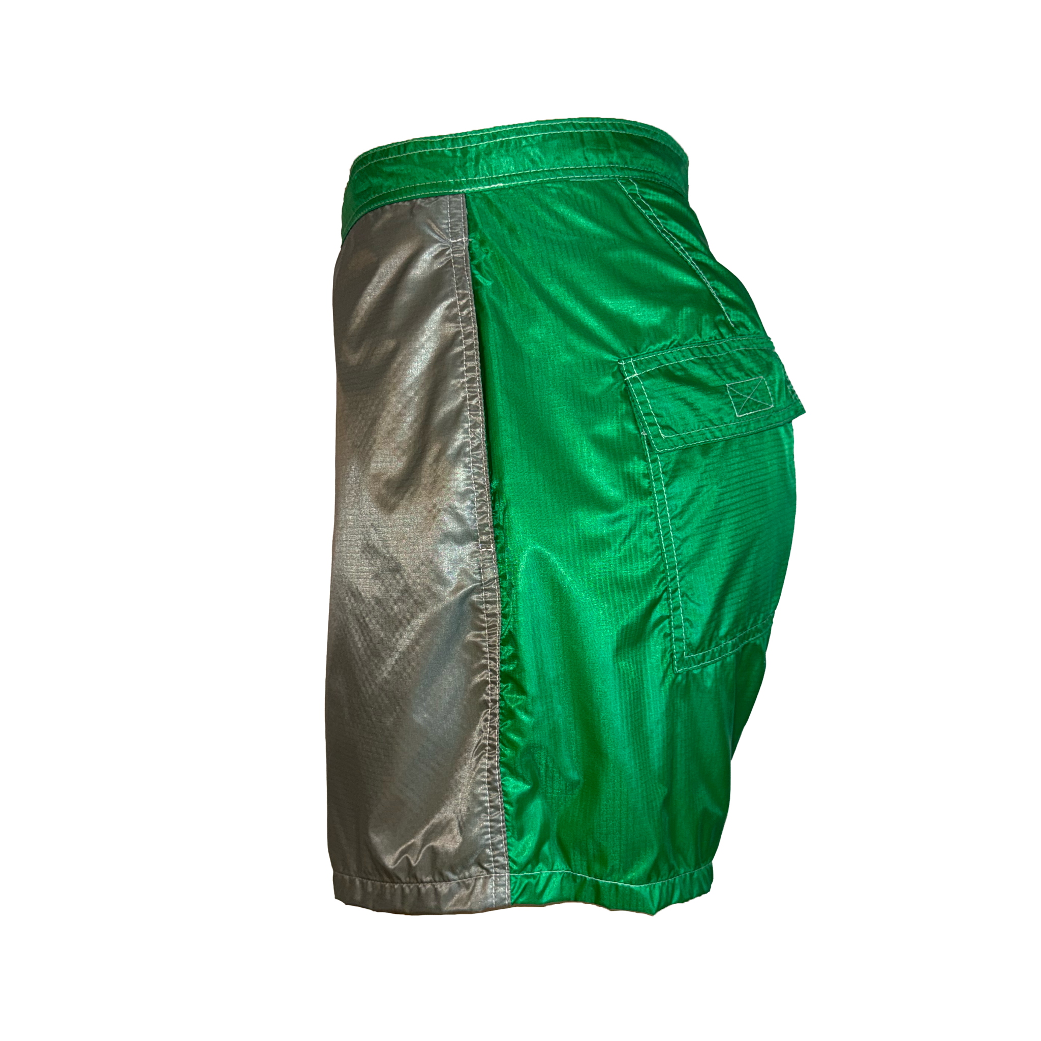 Green athletic shorts with a metallic silver side panel, shown from a side profile view against a white background.