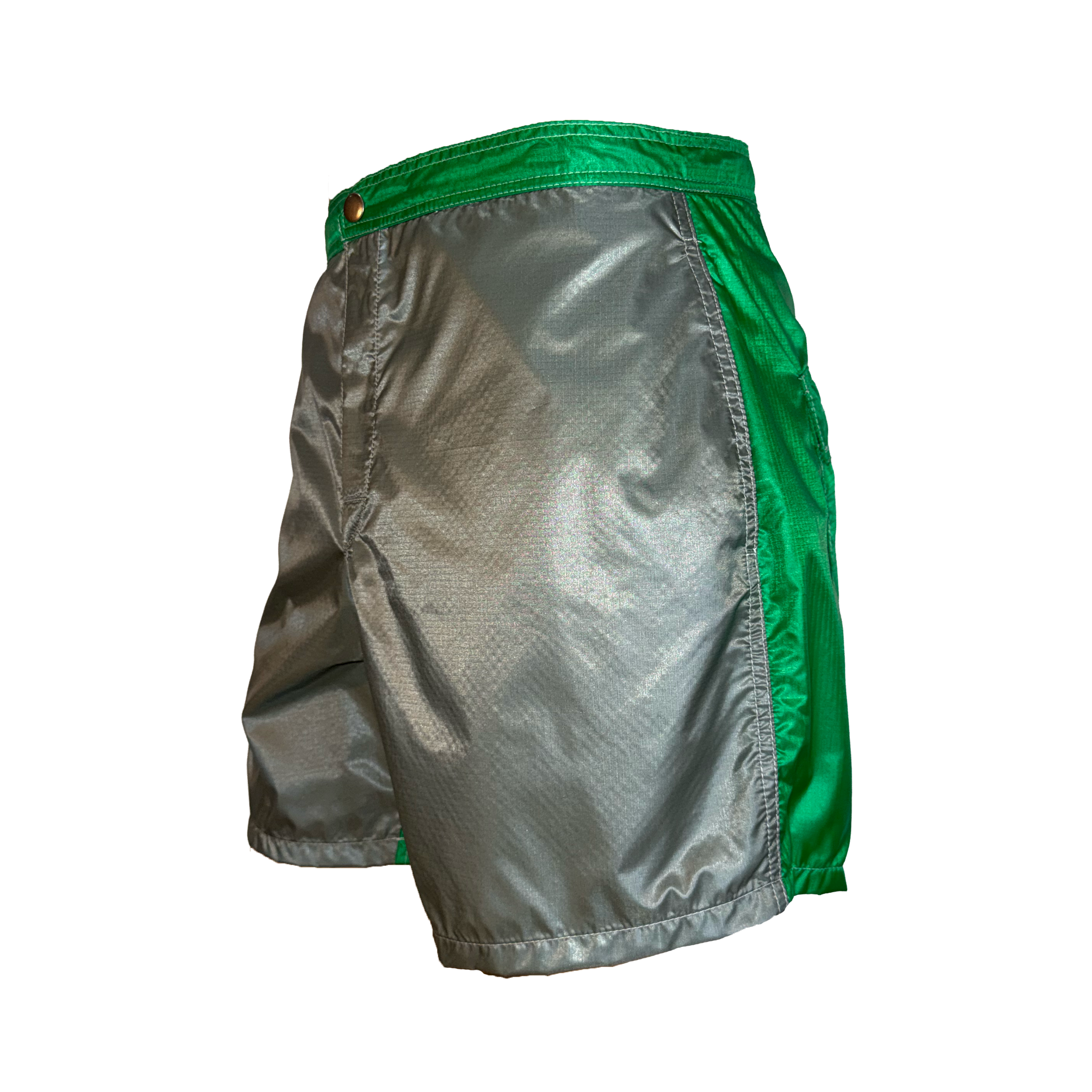 A pair of athletic shorts with a metallic silver-gray body and bright green side panels and waistband, shown against a plain white background.