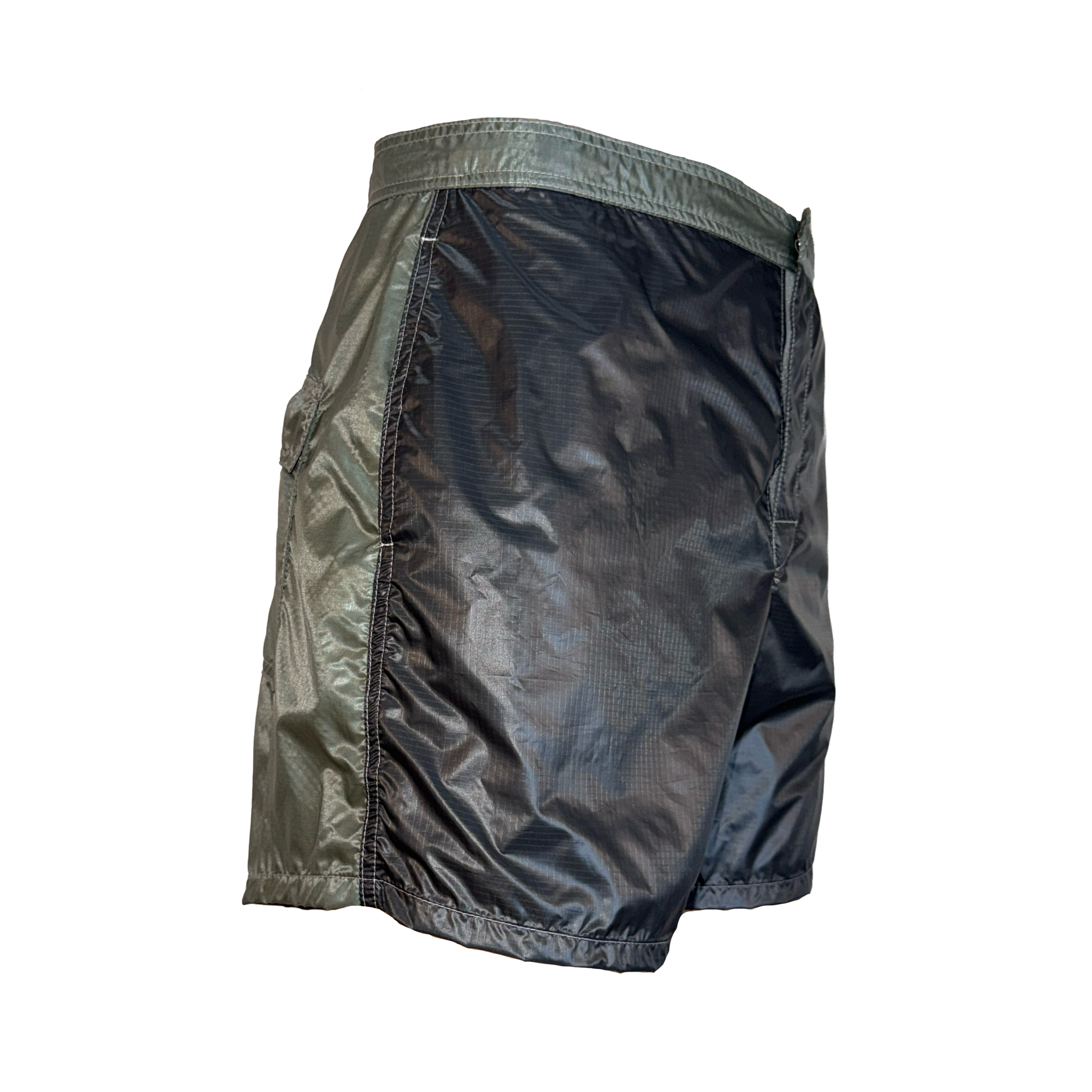 A pair of lightweight, shiny dark gray shorts with a metallic olive green side panel and waistband, shown from a three-quarters angle on a plain white background.