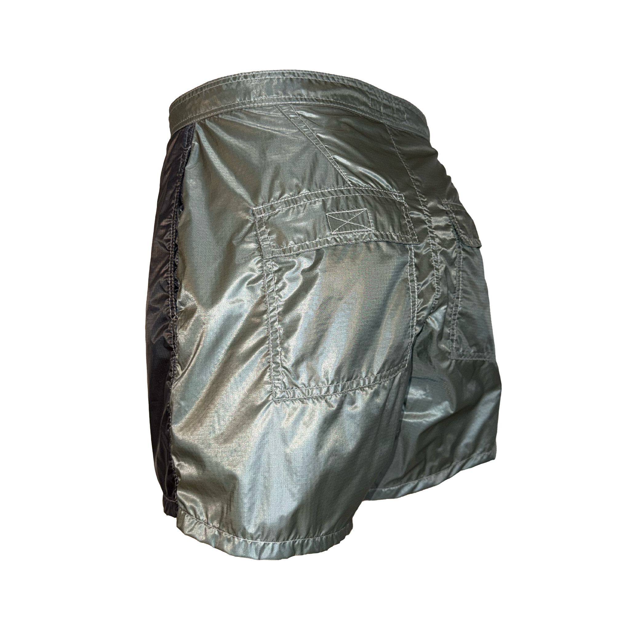 A pair of metallic silver athletic shorts with a quilted black side panel, shown from a three-quarters back view on a white background.
