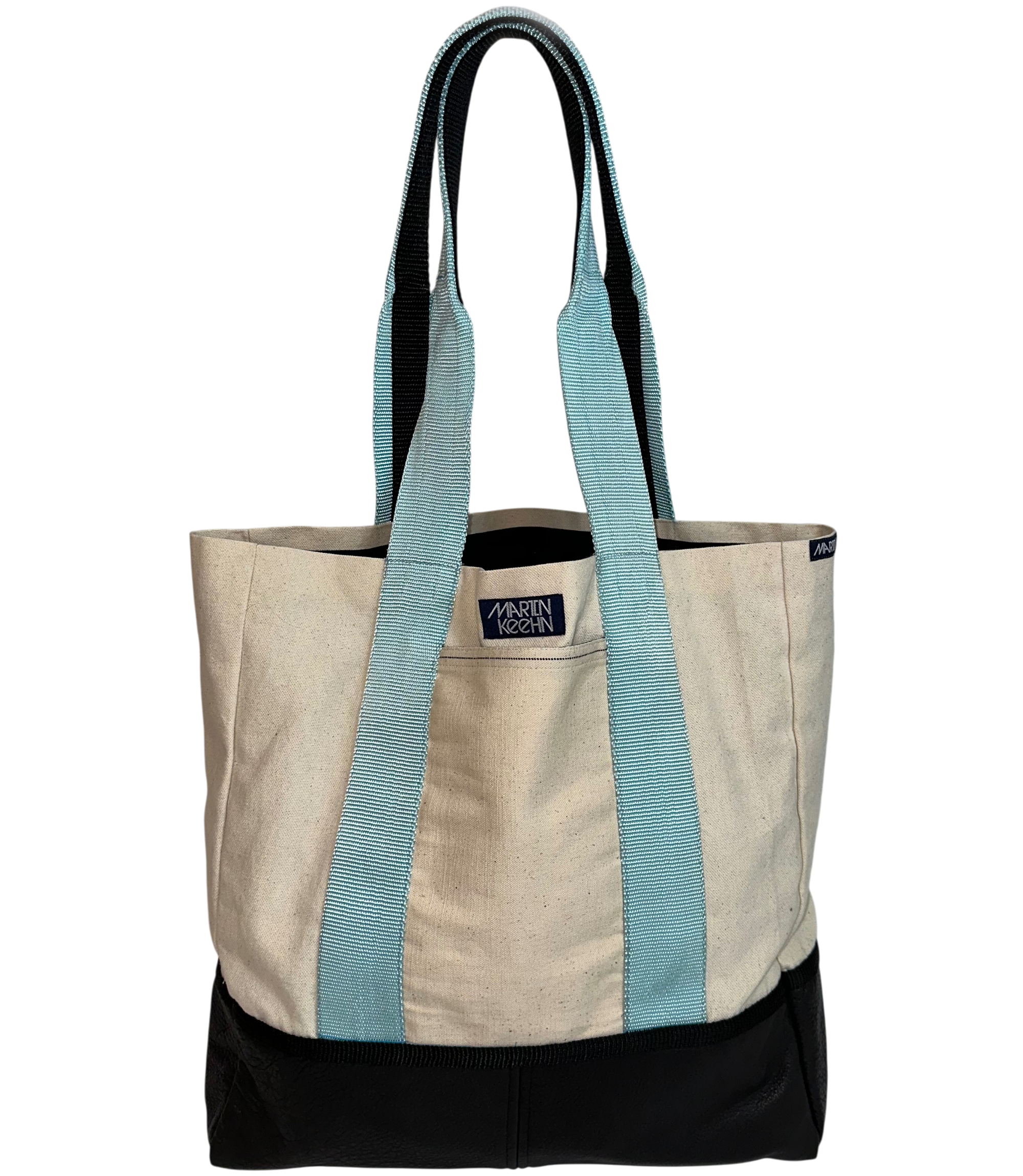 Beige tote bag with blue straps on a white background.